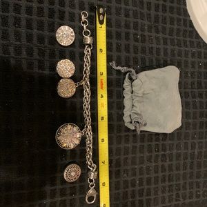 Snap Bracelet Silver in color with 6 interchangeable snap buttons